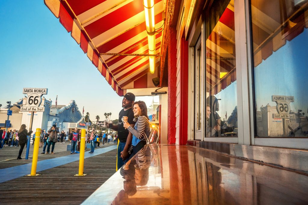 Couple enjoying ice cream outside Pier Burger