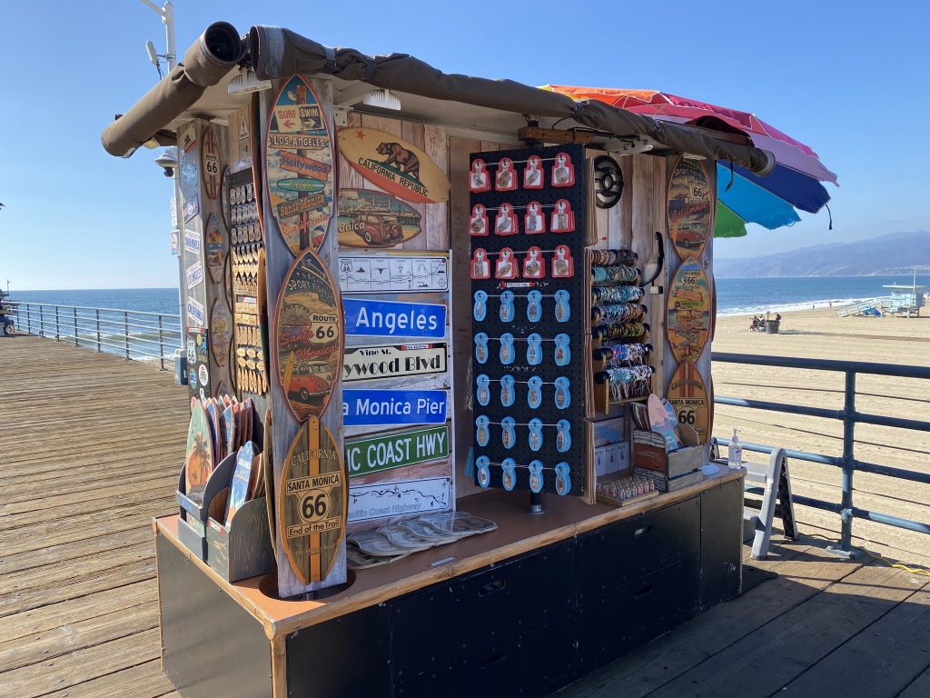 Pier Photo Cart selling decorative signs on the Santa Monica Pier