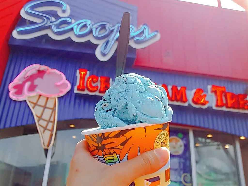 Ice Cream cone in front of Scoops Ice Cream and Treats on the Santa Monica Pier