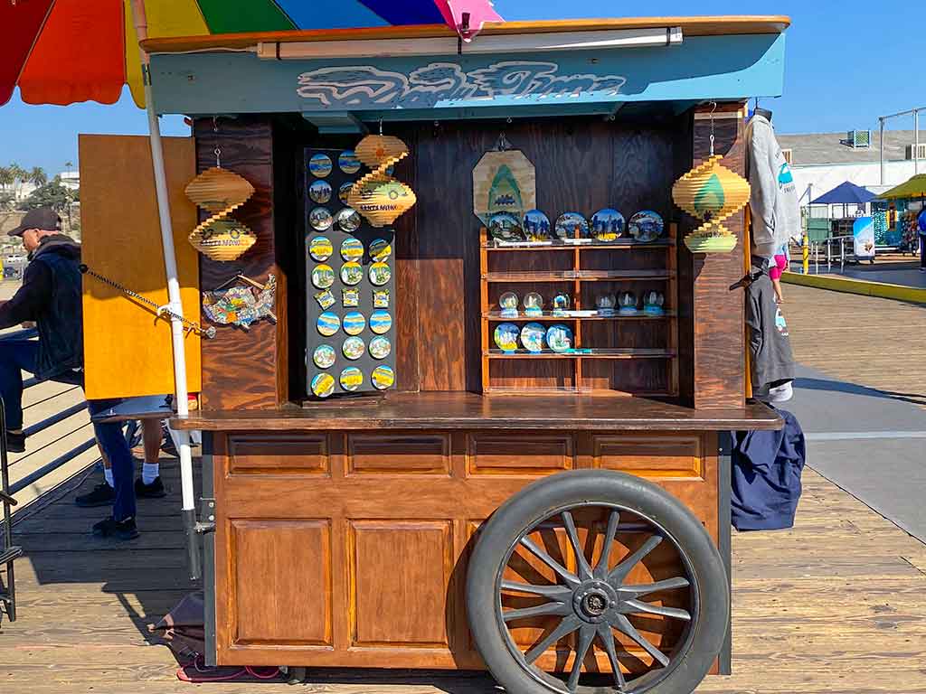 Cart selling hanging wind ornaments on the Santa Monica Pier