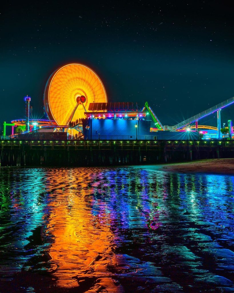 The Santa Monica Pier Ferris Wheel lit Amber for Covid Memorial Photo by @aayuskhjain.jpg