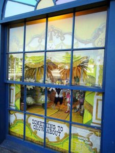 Window with marionettes on display