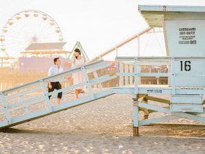 Couple on lifeguard tower, Santa Monica Beach