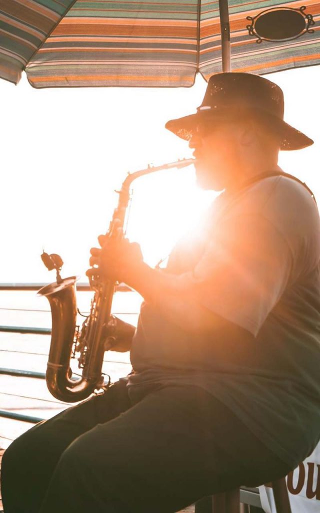 Man playing saxophone on the Santa Monica Pier