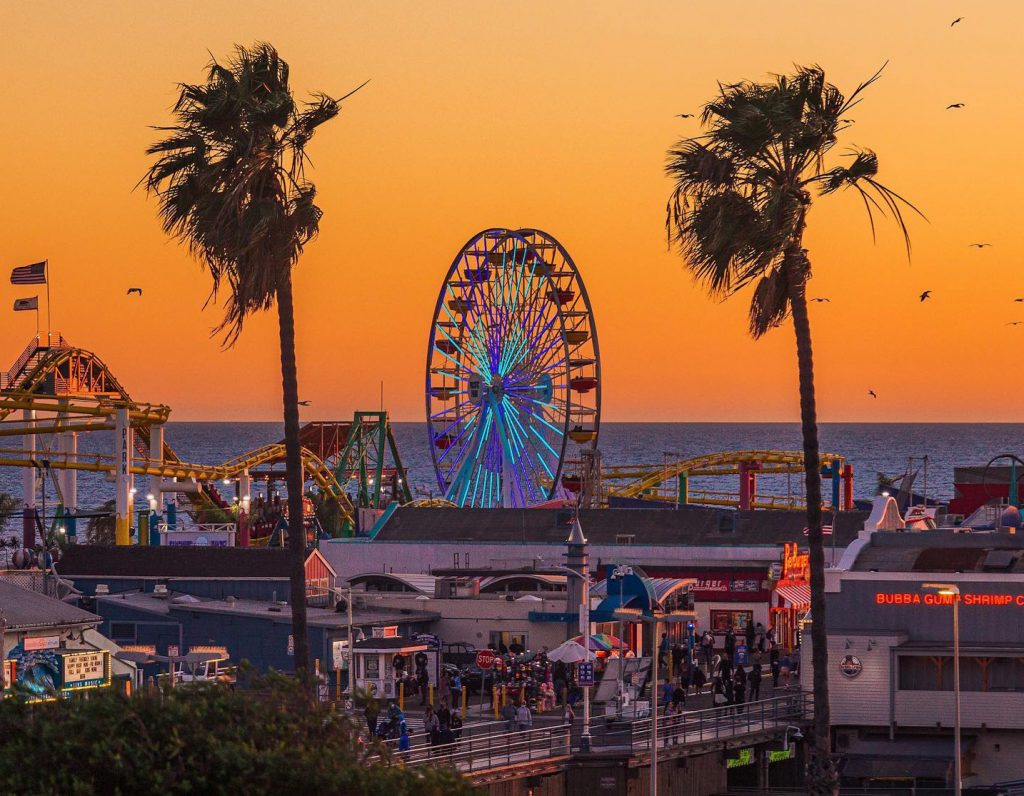 golden sunset picture of the santa monica pier for locals night