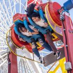 Riders enjoying Pacific Park on the Santa Monica Pier