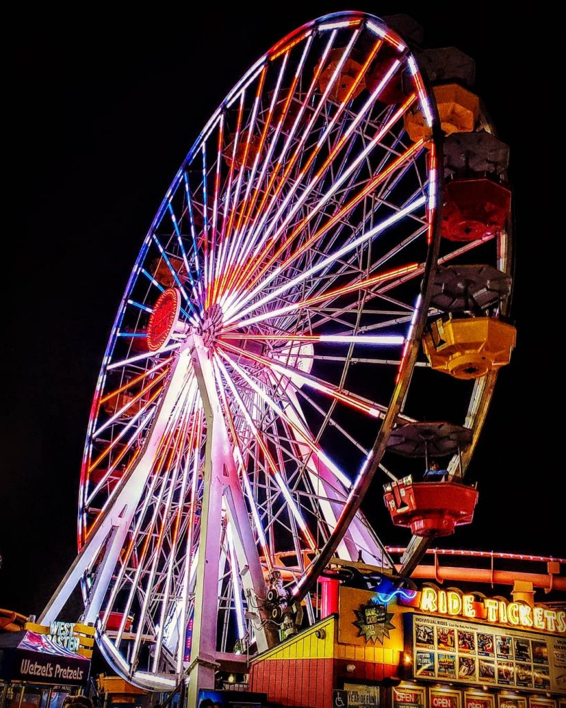 The US flag displayed on the Pacific Wheel in Santa Monica - Photo by @500lightwaves