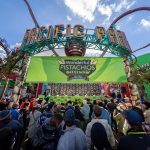 A crowd gathered outside of Pacific Park on the Santa Monica Pier to see competitive eaters set a world record in eating pistachios