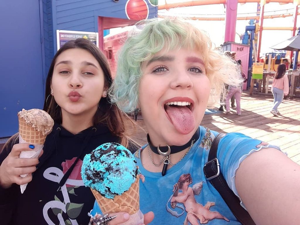 Two girls enjoy cones of Lappert's Ice Cream on National Ice Cream Day on July 16 at the Santa Monica Pier